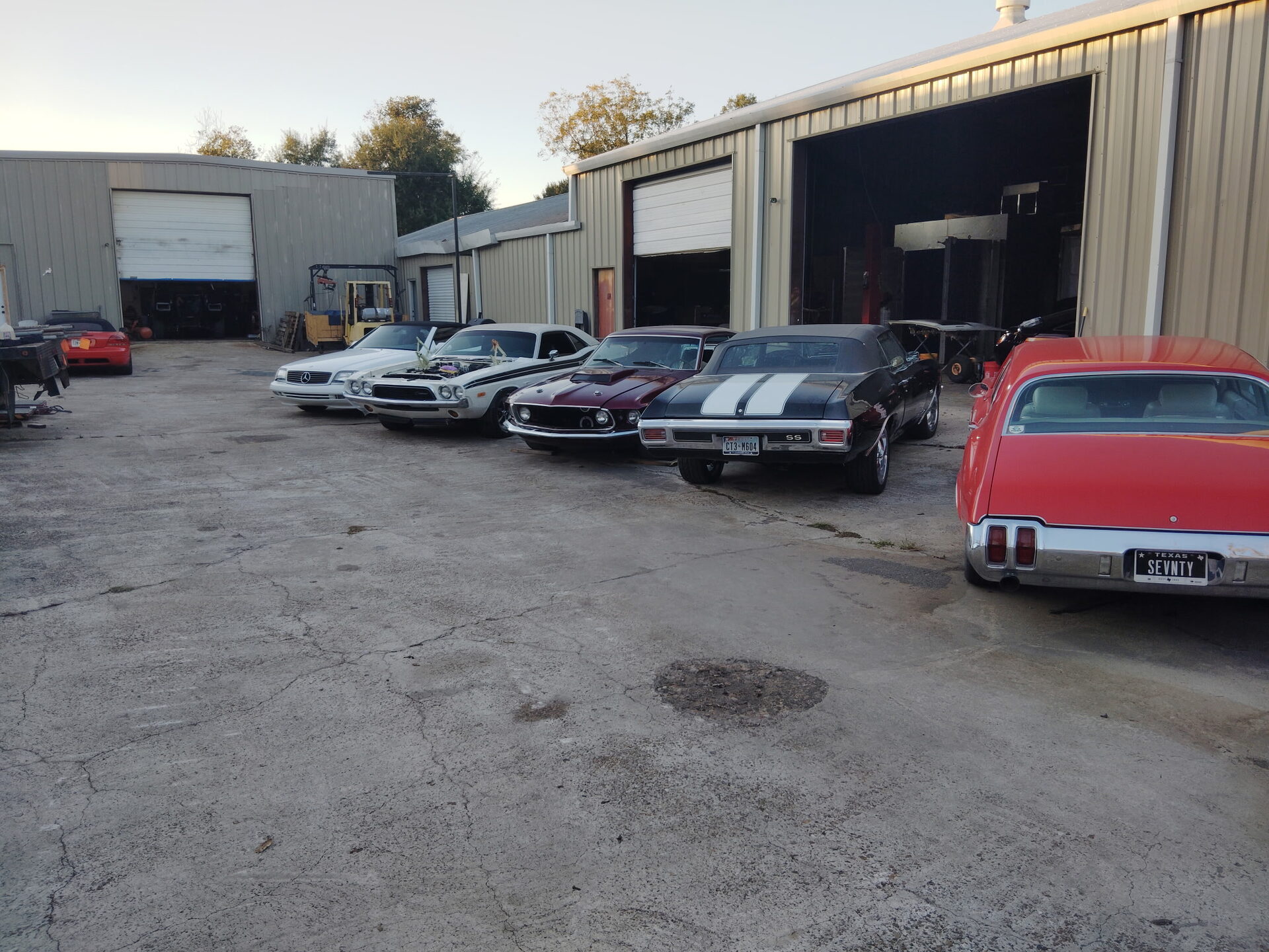 Vehicles lined up outside the Symphonia Werks facility in Houston